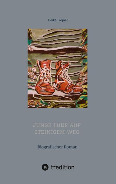 Junge Füße auf steinigem Weg