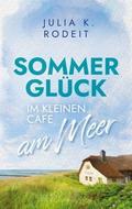 Sommerglück im kleinen Café am Meer