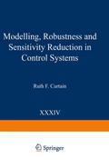 Modelling, Robustness and Sensitivity Reduction in