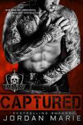 Captured (Devil’s Blaze MC, #1)