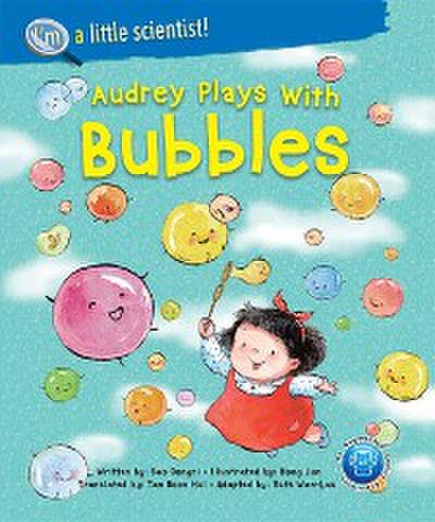 AUDREY PLAYS WITH BUBBLES