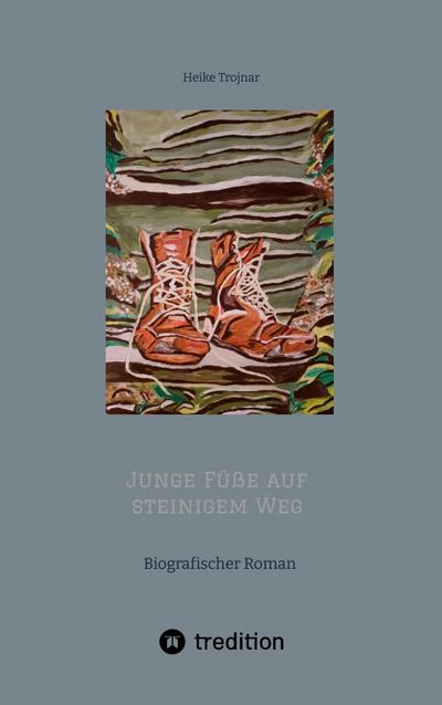 Junge Füße auf steinigem Weg