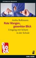 Rote Wangen, gesenkter Blick