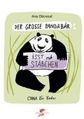 Der große Panda isst mit Stäbchen