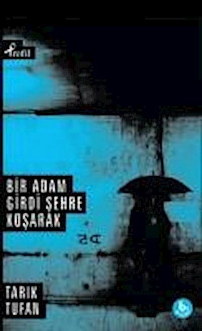 Bir Adam Girdi Sehre Kosarak