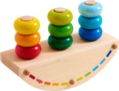 HABA 303228 - Steckspiel Regenbogen-Schaukel | Holzspielzeug aus Wippe, 3 Stäben und 9 bunten Ringen zum Zusammenstecken | Spielzeug ab 18 Monaten