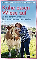 Kühe essen Wiese auf