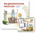 Buch ’Die geheimnisvolle Holztruhe’ und Charakterkarten ’Die Burggemeinschaft’