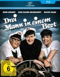 Drei Mann in einem Boot